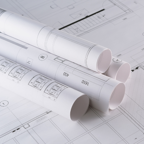 Rolled blueprints.